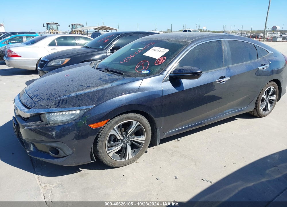2016 HONDA CIVIC TOURING VIN: 19XFC1F99GE014509