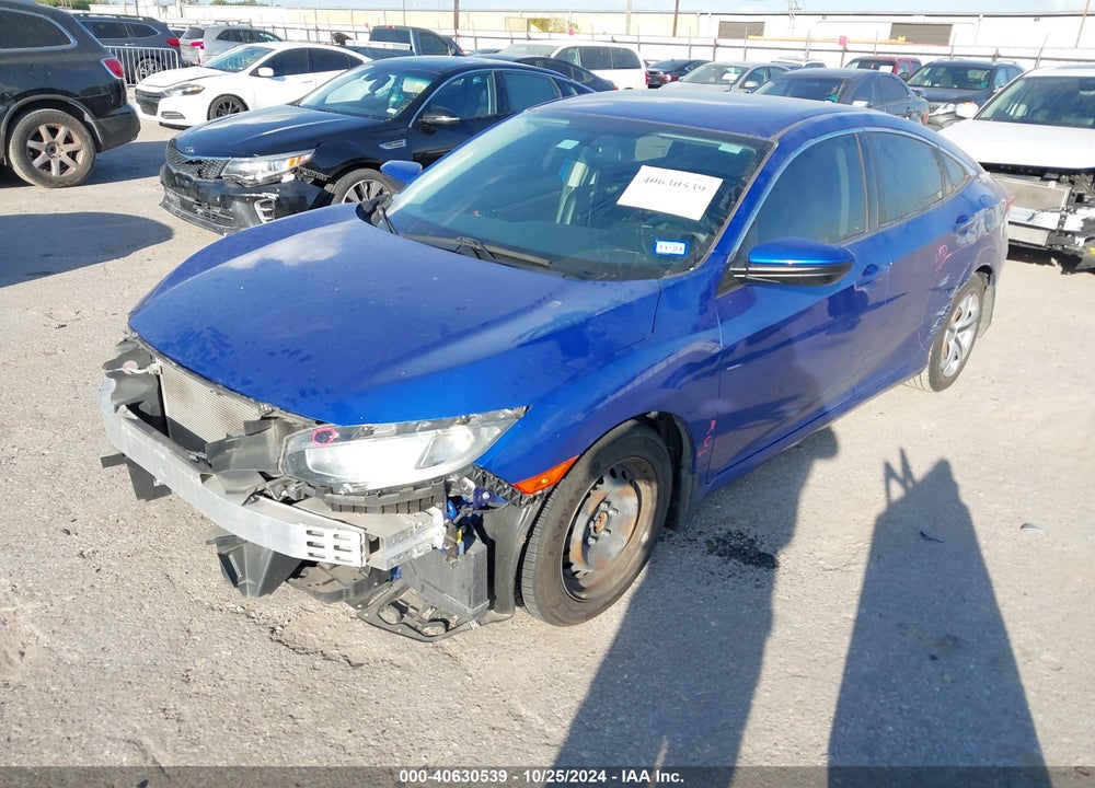 2018 HONDA CIVIC LX VIN: 2HGFC2F57JH552335