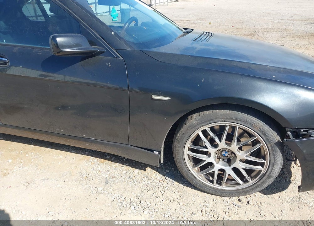 2007 BMW 750 I VIN: WBAHL83557DT10001