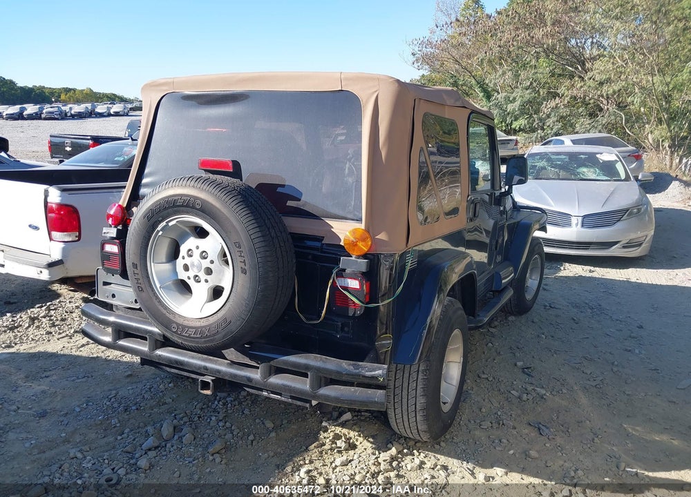 2002 JEEP WRANGLER SAHARA VIN: 1J4FA59S62P761404