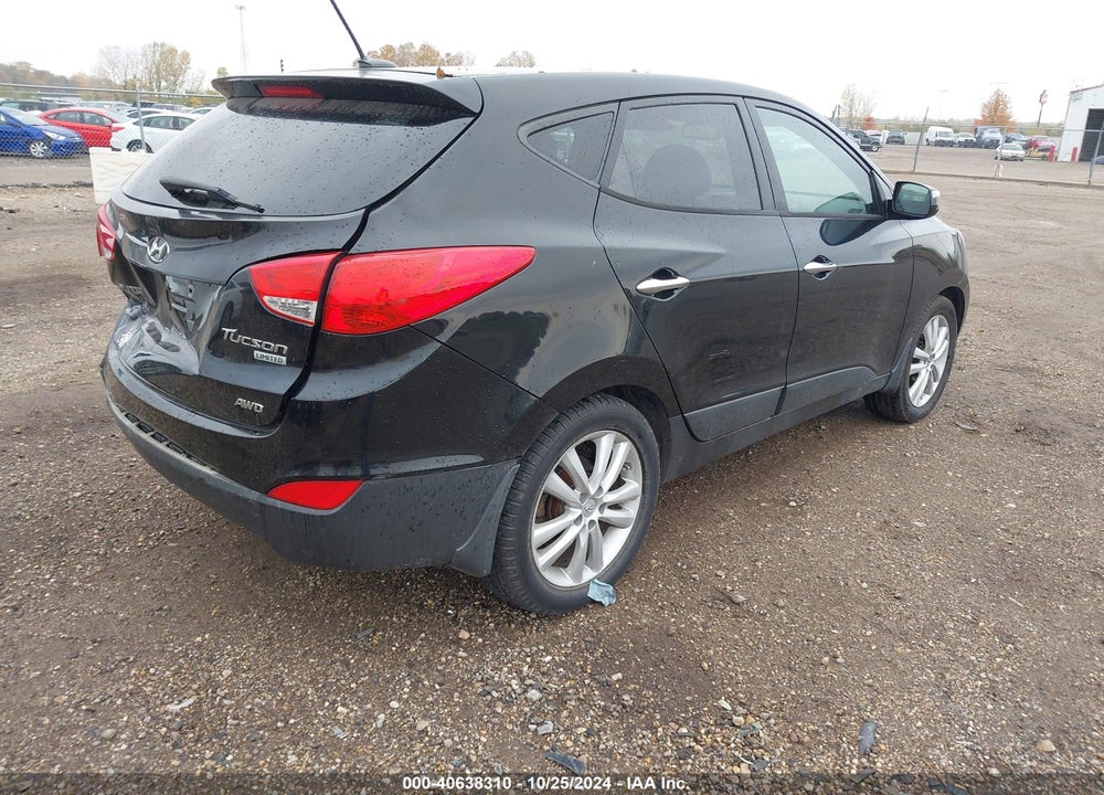 2011 HYUNDAI TUCSON LIMITED VIN: KM8JUCAC6BU227218