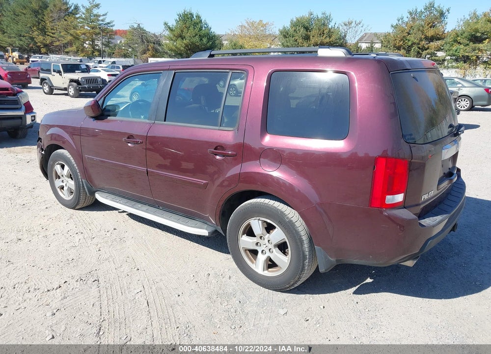 2011 HONDA PILOT EX-L VIN: 5FNYF4H55BB060739