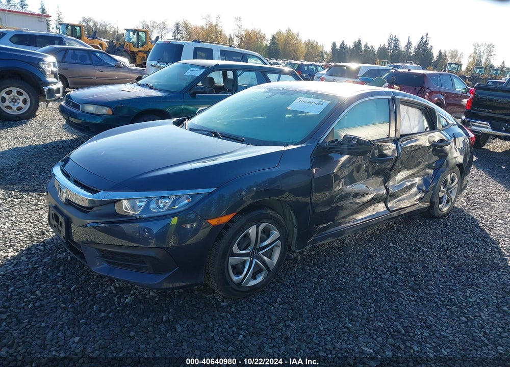 2018 HONDA CIVIC LX VIN: 2HGFC2E57JH572683