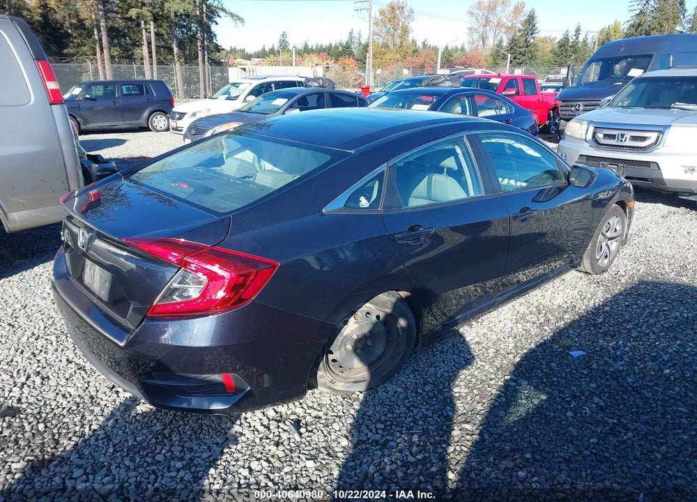 2018 HONDA CIVIC LX VIN: 2HGFC2E57JH572683