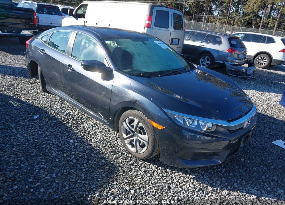 2018 HONDA CIVIC LX VIN: 2HGFC2E57JH572683