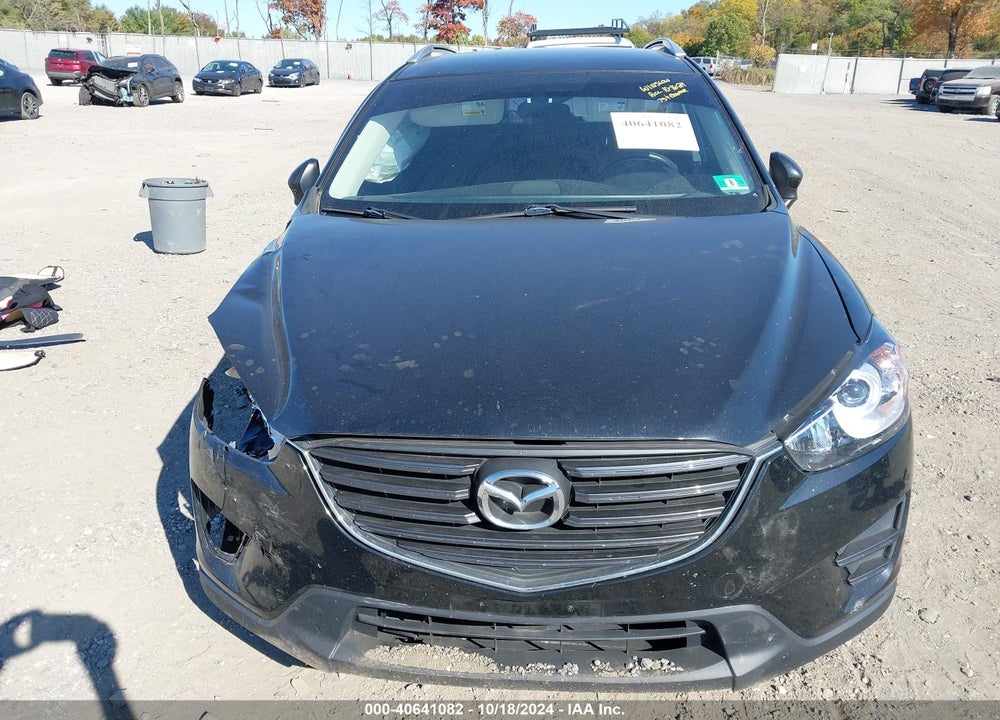 2016 MAZDA CX-5 SPORT VIN: JM3KE4BY9G0744573