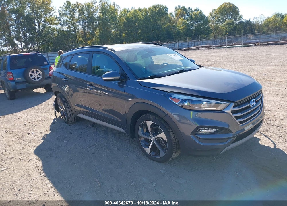 2018 HYUNDAI TUCSON VALUE VIN: KM8J3CA26JU753471