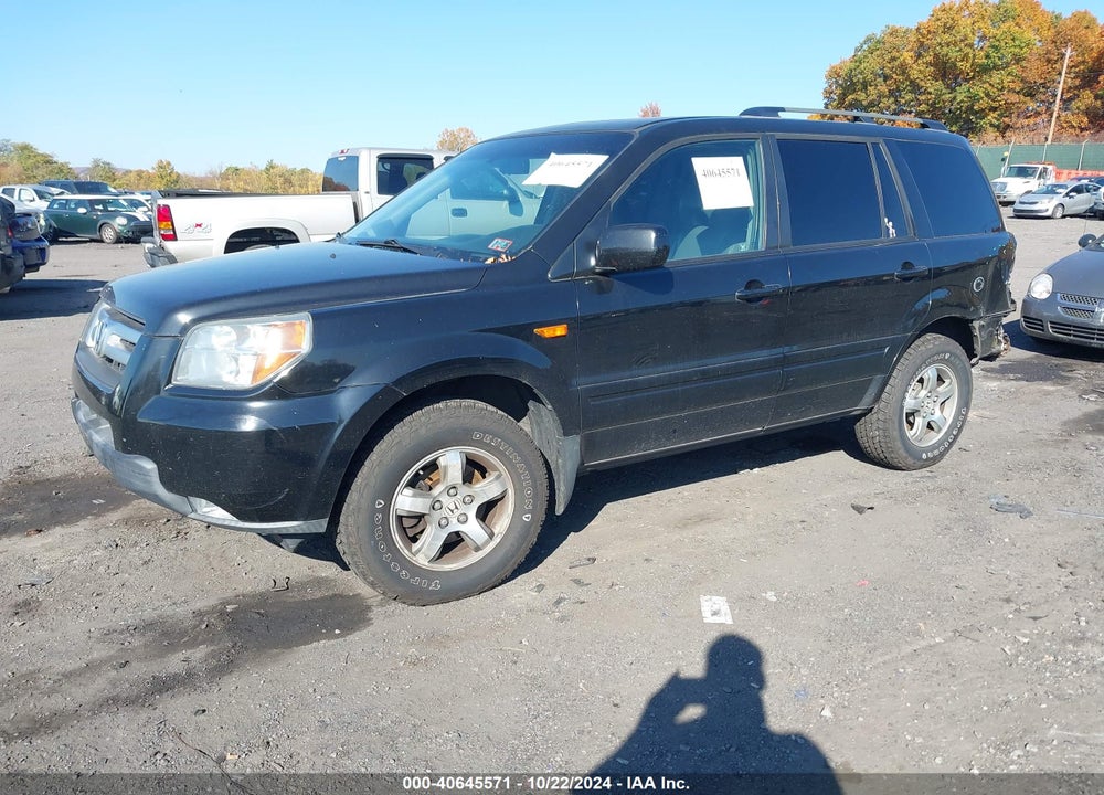 2007 HONDA PILOT EX-L VIN: 5FNYF18537B029897