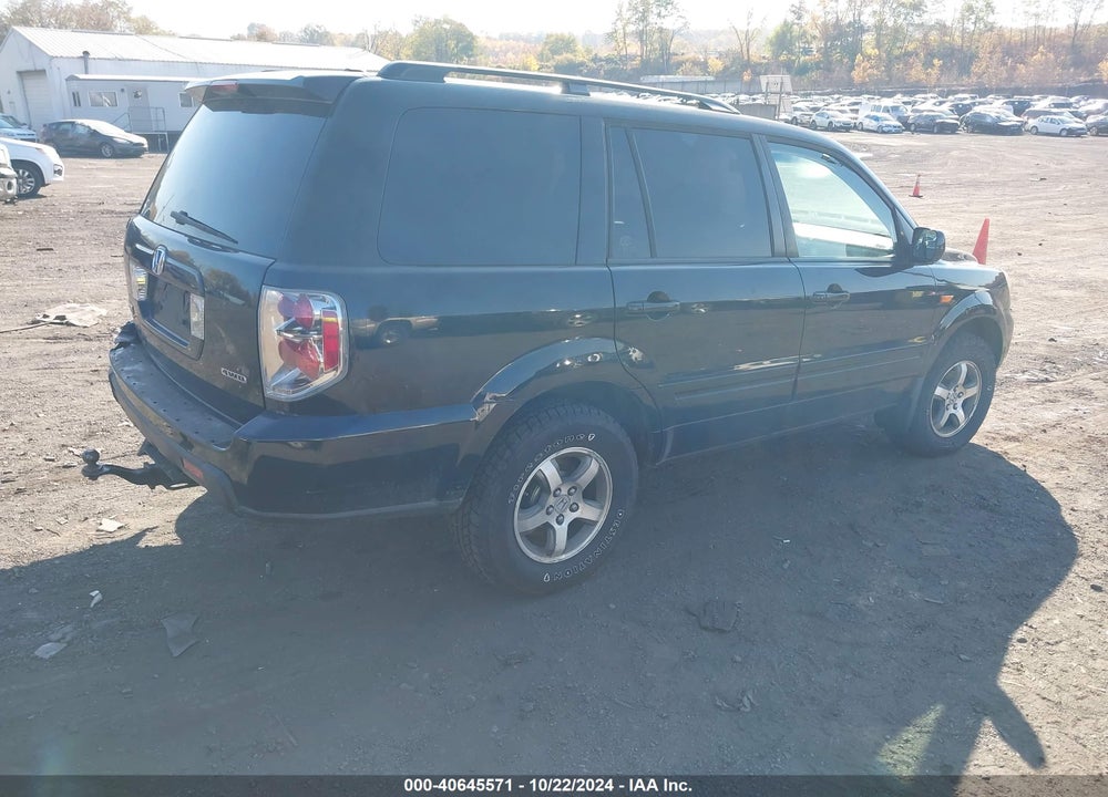 2007 HONDA PILOT EX-L VIN: 5FNYF18537B029897