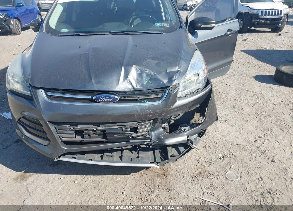 2016 FORD ESCAPE TITANIUM VIN: 1FMCU9JX9GUC38316