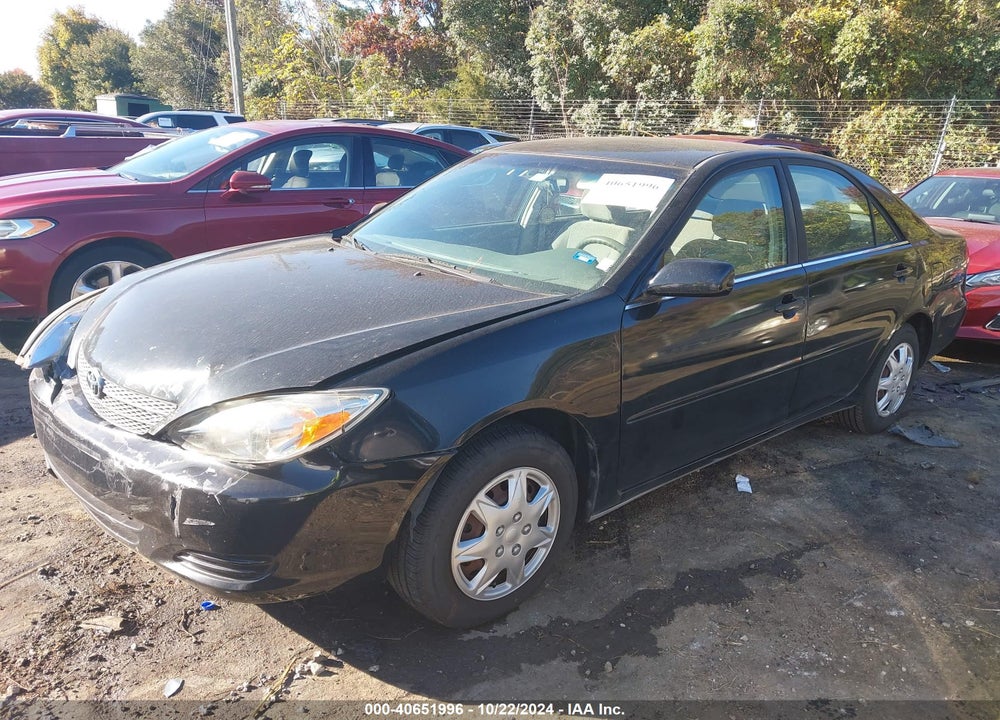 2004 TOYOTA CAMRY LE VIN: JTDBE32K140272444