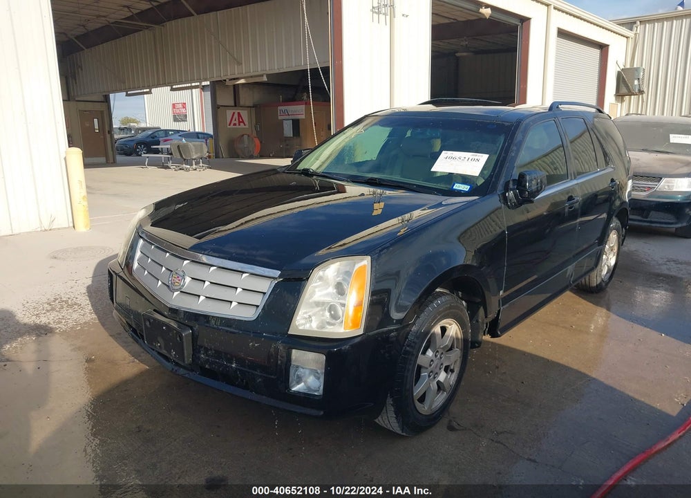 2009 CADILLAC SRX V6 VIN: 1GYEE637890114869