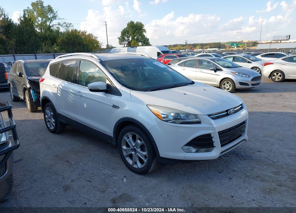 2016 FORD ESCAPE TITANIUM VIN: 1FMCU0JX1GUC39908