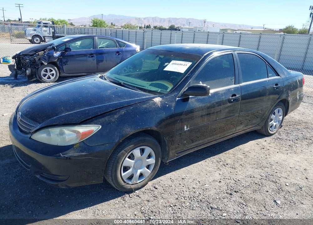 2003 TOYOTA CAMRY LE VIN: JTDBE32K030234203