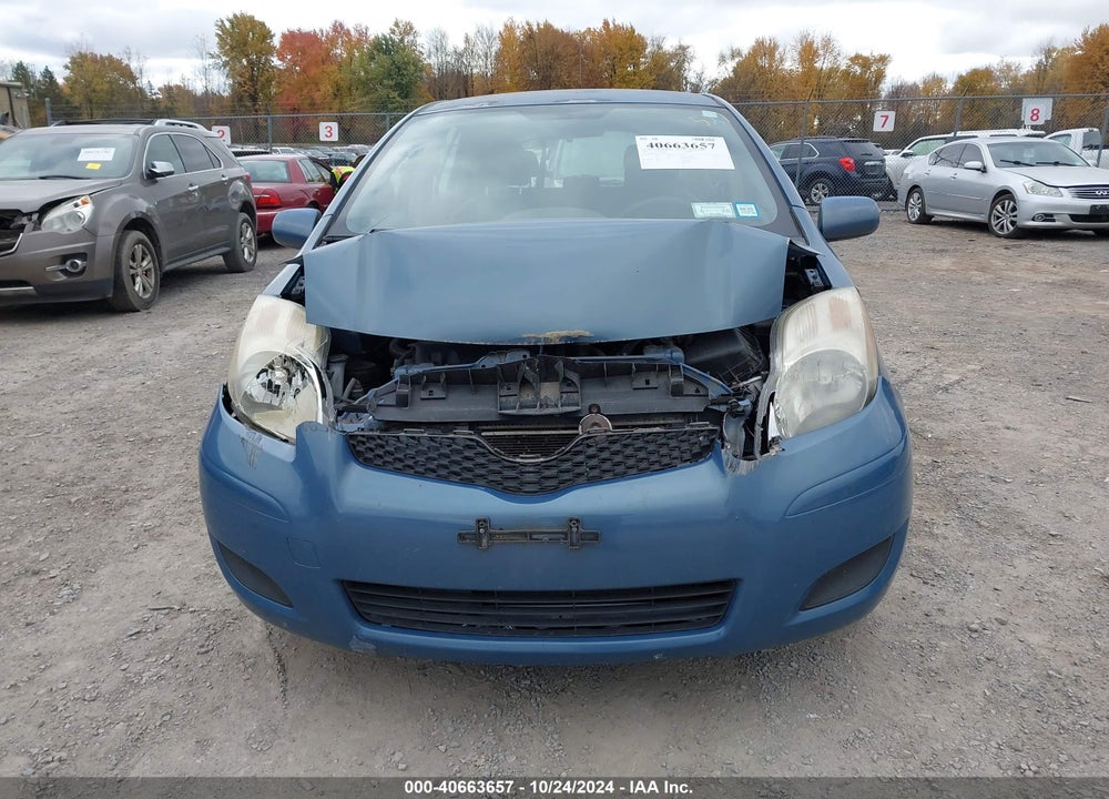 2009 TOYOTA YARIS VIN: JTDKT903595254785
