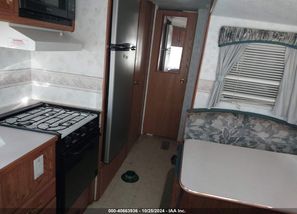 1999 FLEETWOOD WILDERNESS VIN: 1ED1G3126X2891563