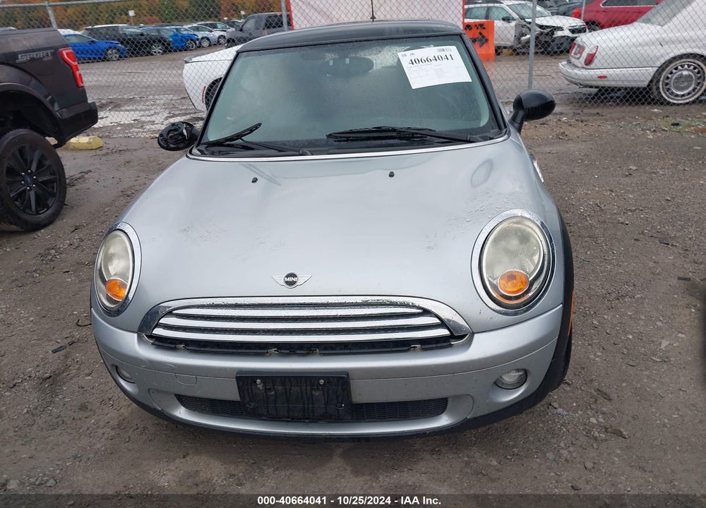2009 MINI COOPER VIN: WMWMF33549TU74843