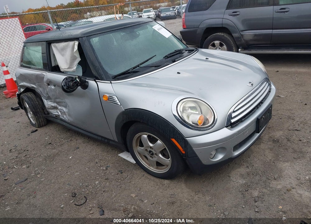 2009 MINI COOPER VIN: WMWMF33549TU74843