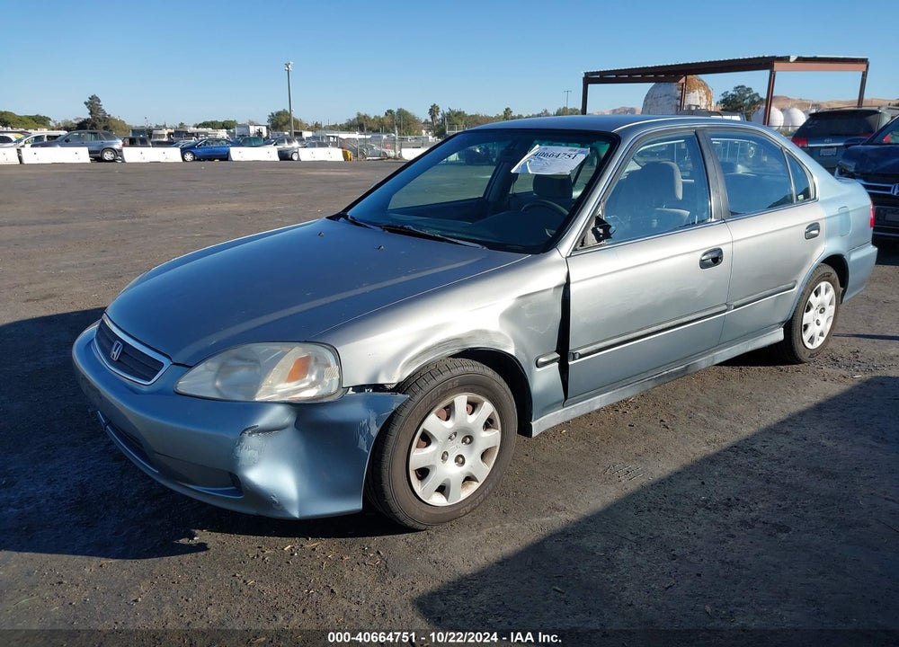 1999 HONDA CIVIC LX VIN: 2HGEJ6674XH587031