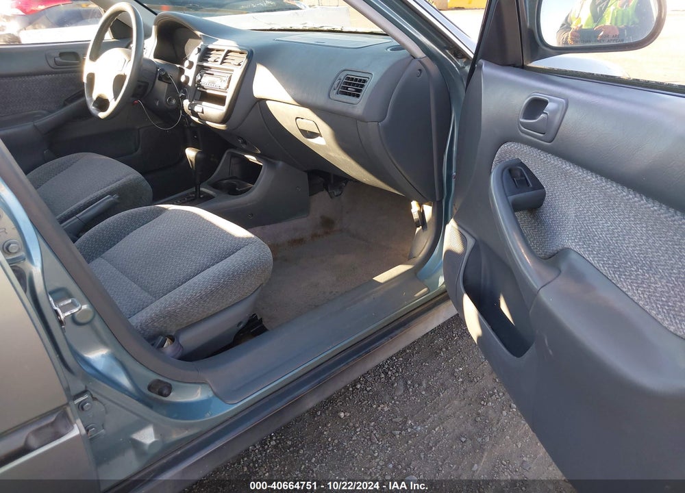 1999 HONDA CIVIC LX VIN: 2HGEJ6674XH587031