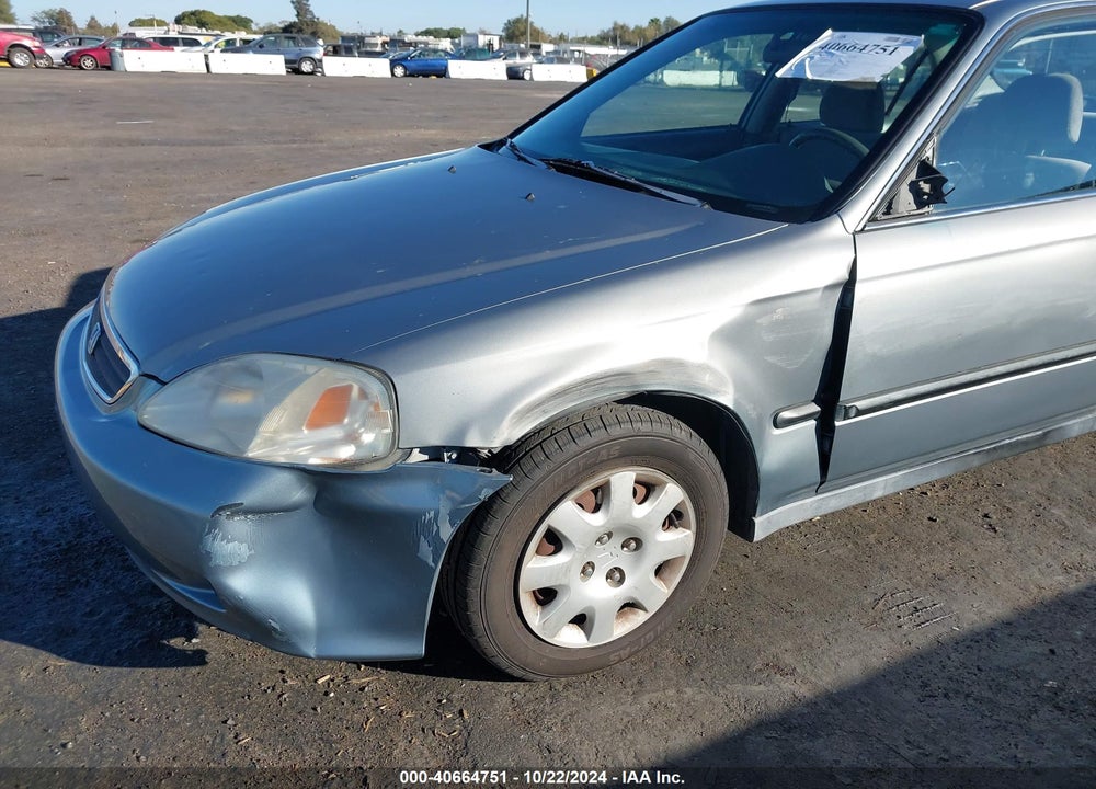 1999 HONDA CIVIC LX VIN: 2HGEJ6674XH587031