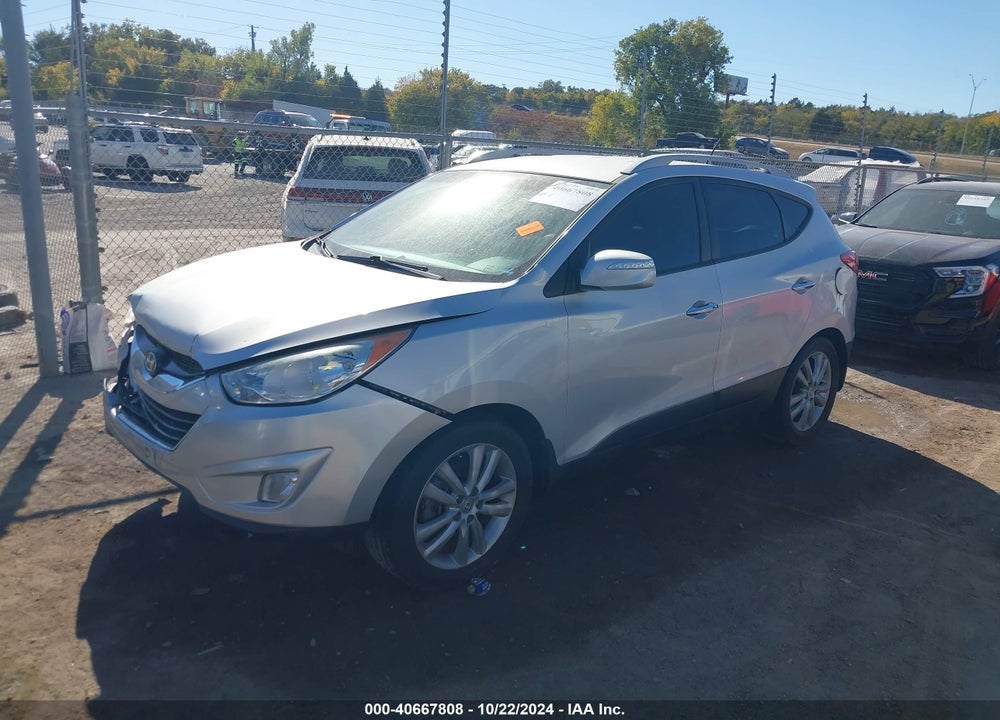 2013 HYUNDAI TUCSON LIMITED VIN: KM8JU3AC0DU736790