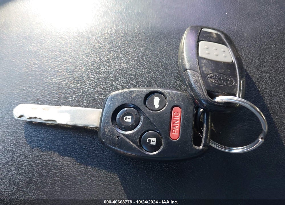 2011 HONDA PILOT EX-L VIN: 5FNYF4H54BB044578