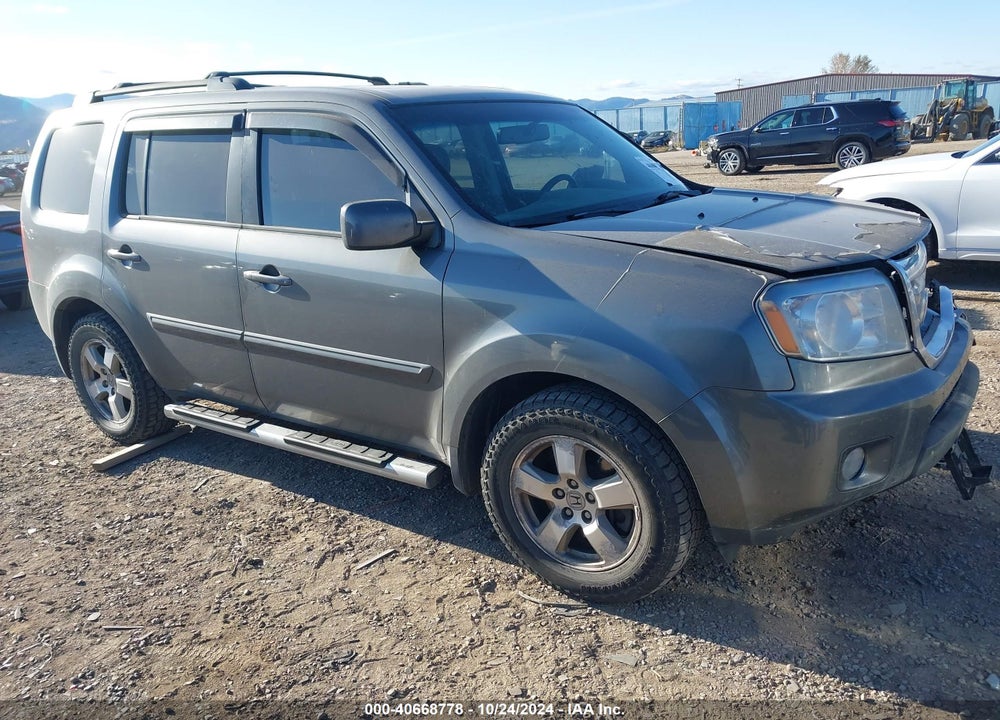 2011 HONDA PILOT EX-L VIN: 5FNYF4H54BB044578