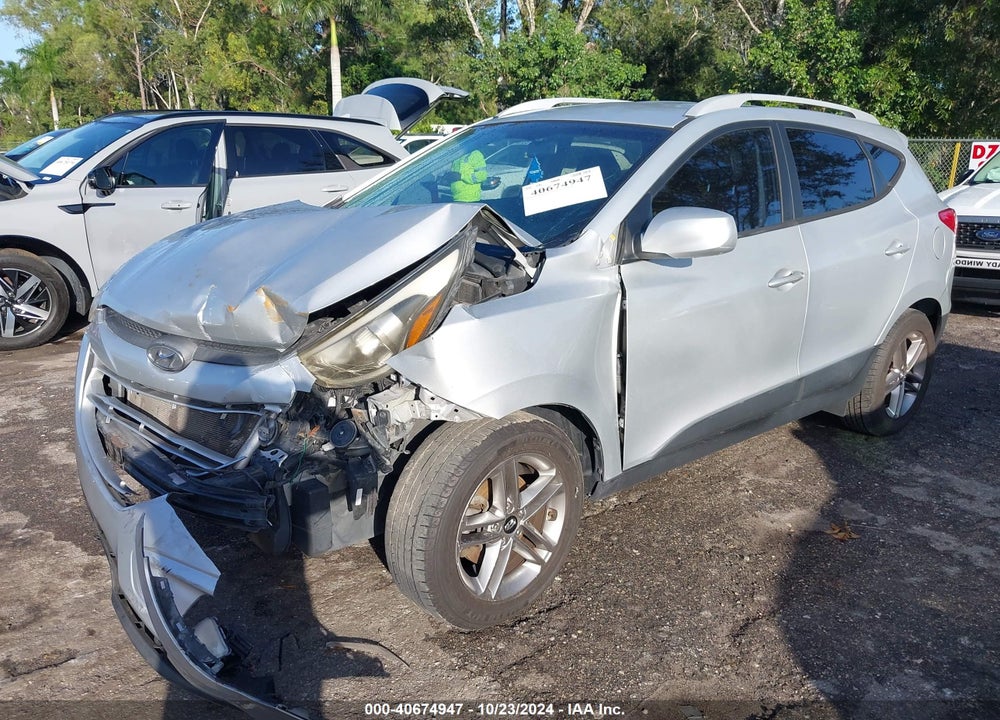 2014 HYUNDAI TUCSON SE VIN: KM8JU3AG7EU934173