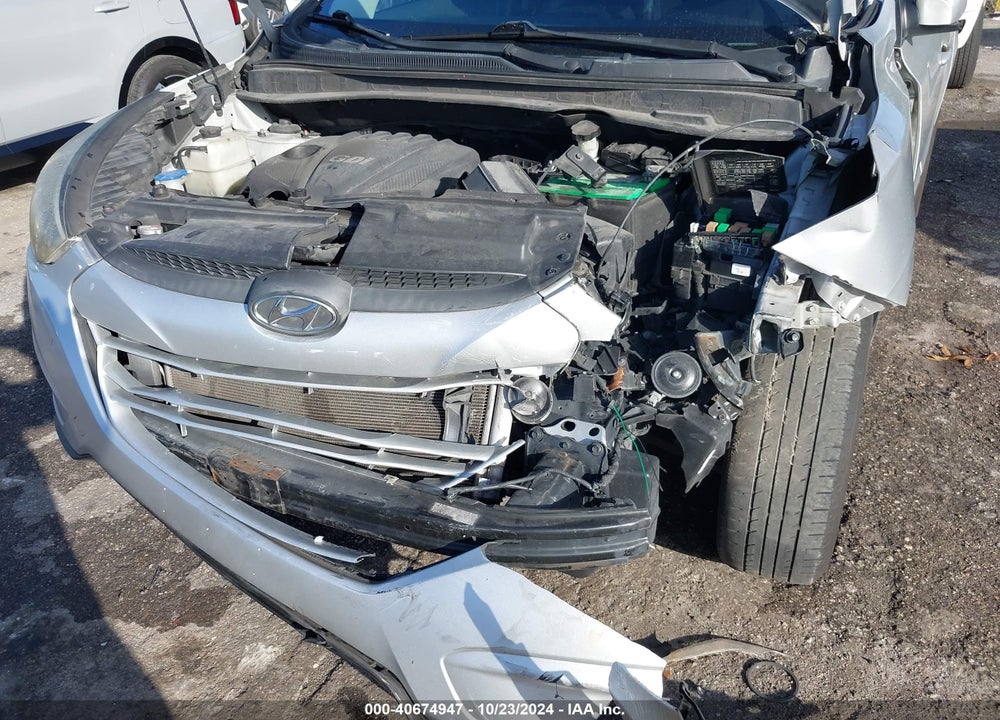 2014 HYUNDAI TUCSON SE VIN: KM8JU3AG7EU934173