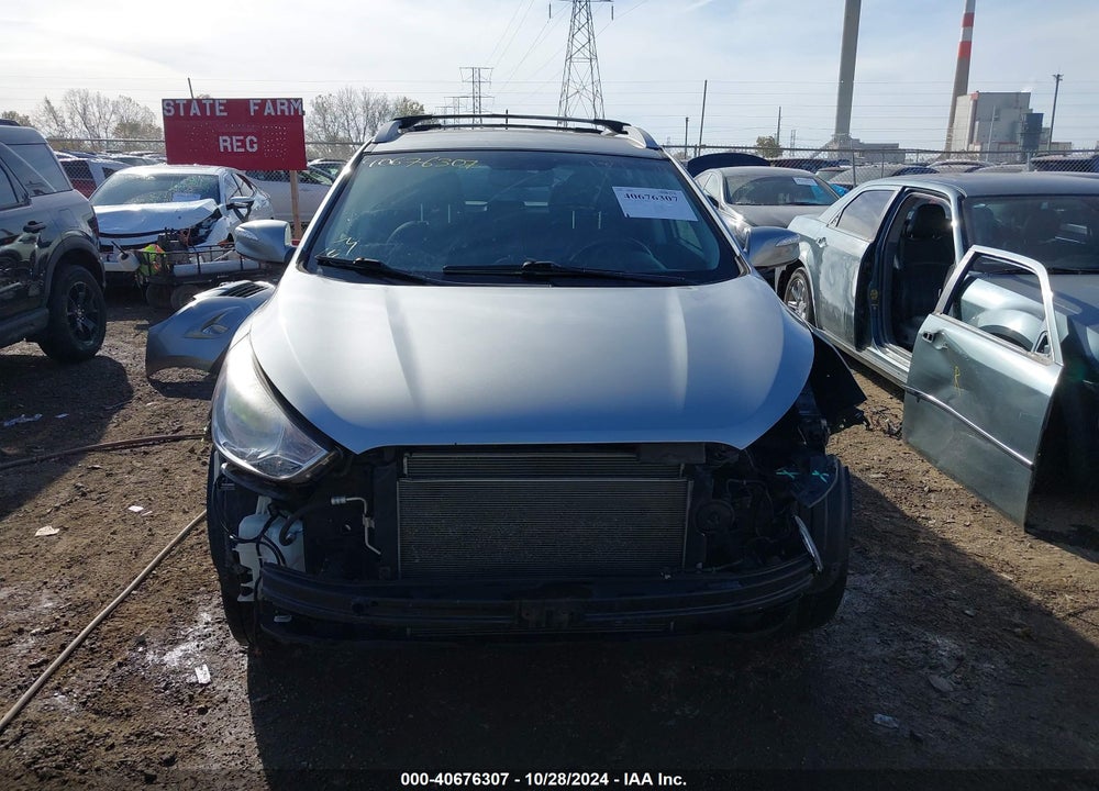2012 HYUNDAI TUCSON LIMITED VIN: KM8JUCAC3CU382679