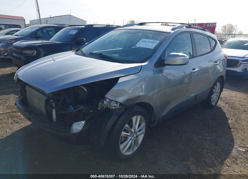 2012 HYUNDAI TUCSON LIMITED VIN: KM8JUCAC3CU382679