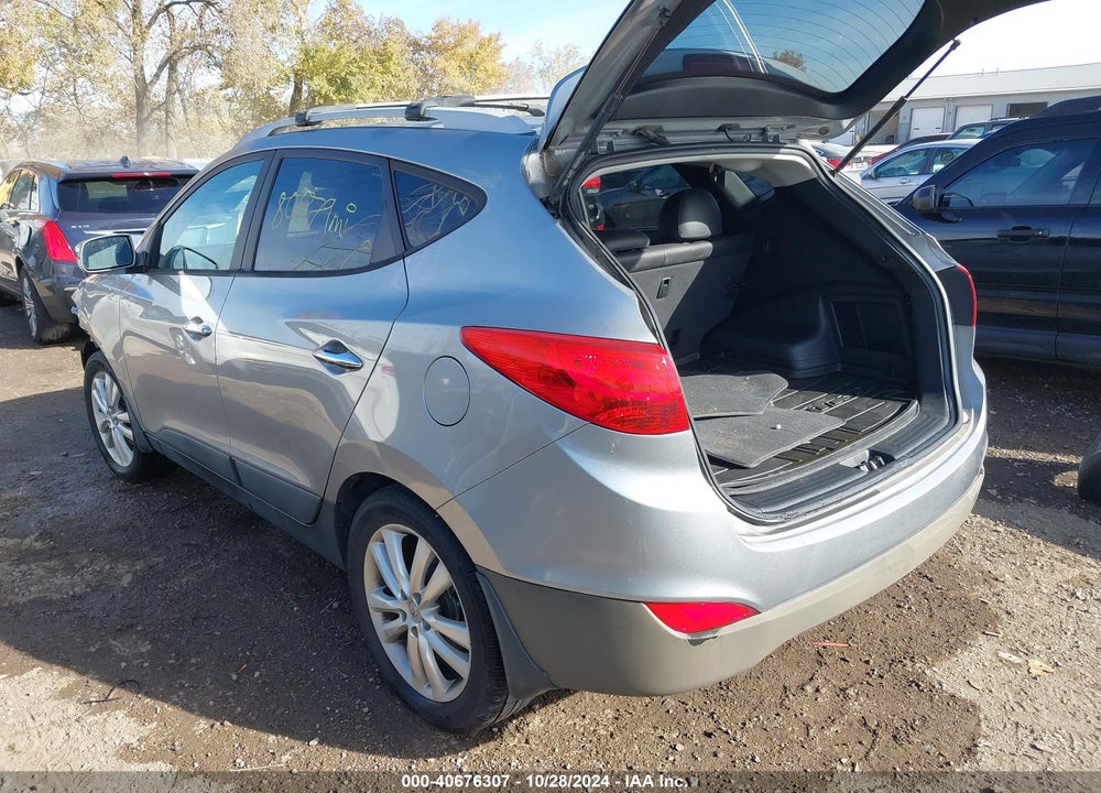 2012 HYUNDAI TUCSON LIMITED VIN: KM8JUCAC3CU382679