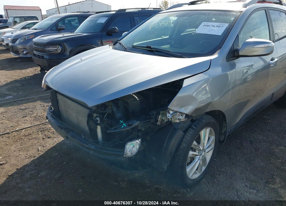 2012 HYUNDAI TUCSON LIMITED VIN: KM8JUCAC3CU382679