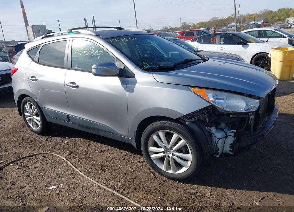 2012 HYUNDAI TUCSON LIMITED VIN: KM8JUCAC3CU382679