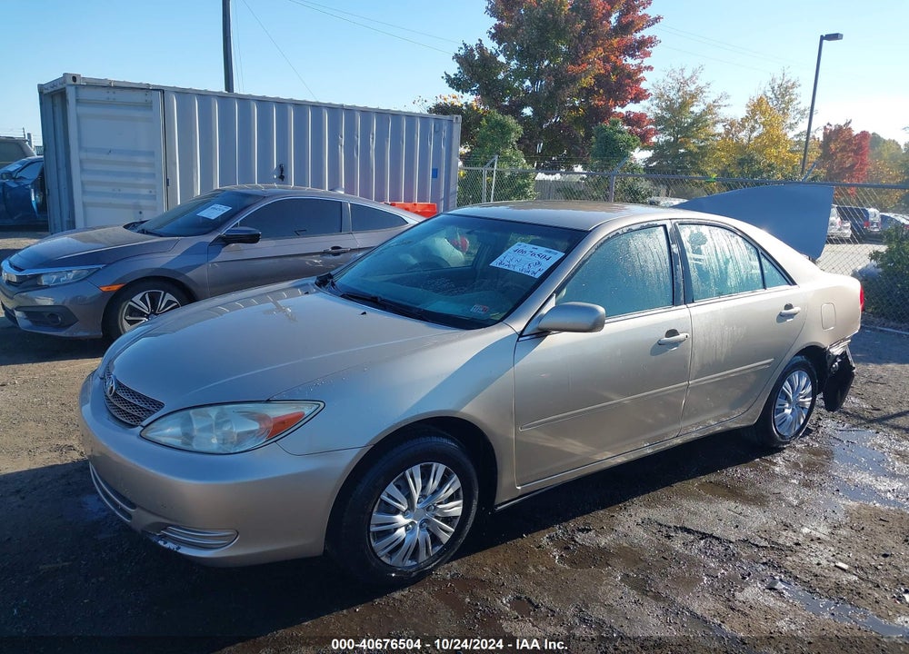 2002 TOYOTA CAMRY LE VIN: JTDBE32K620055064