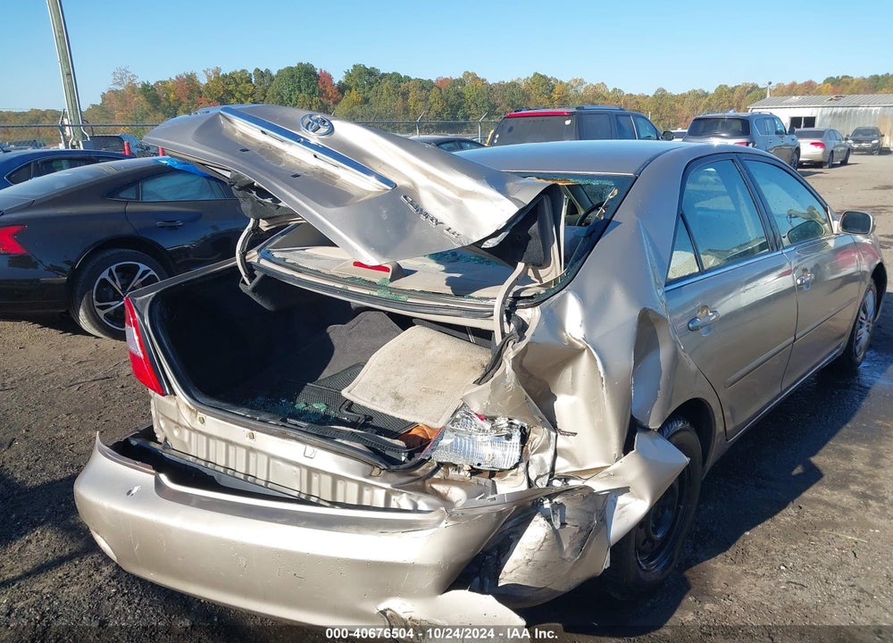 2002 TOYOTA CAMRY LE VIN: JTDBE32K620055064