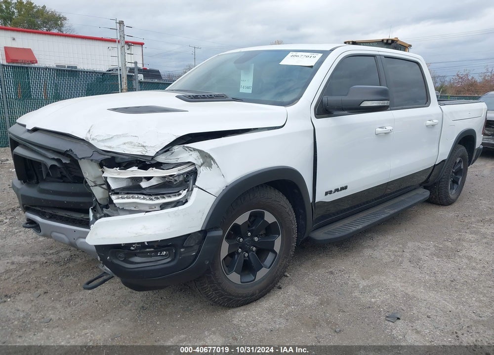 2019 RAM 1500 REBEL 4X4 5'7 BOX VIN: 1C6SRFLT7KN723185