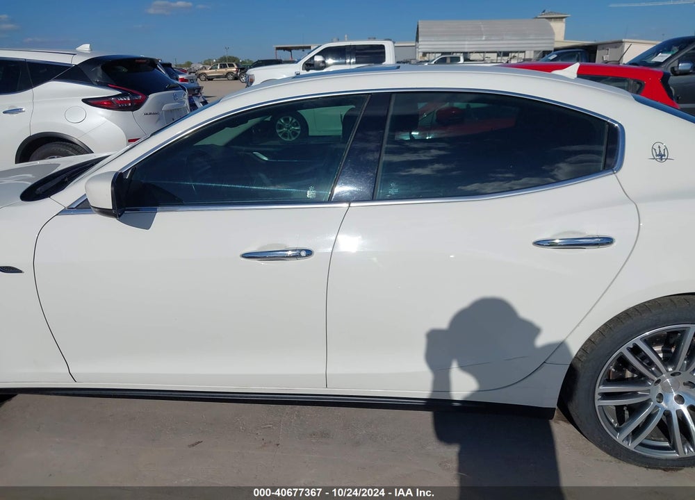 2014 MASERATI GHIBLI VIN: ZAM57RTA7E1109644
