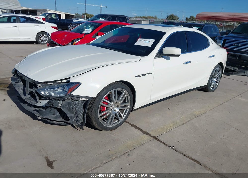 2014 MASERATI GHIBLI VIN: ZAM57RTA7E1109644