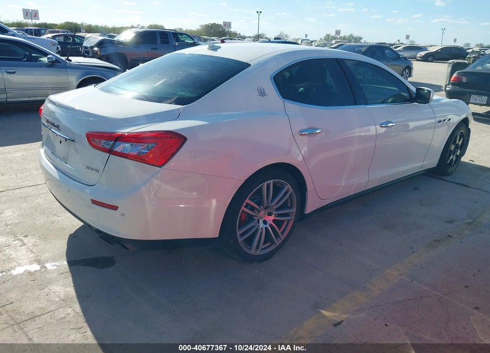 2014 MASERATI GHIBLI VIN: ZAM57RTA7E1109644