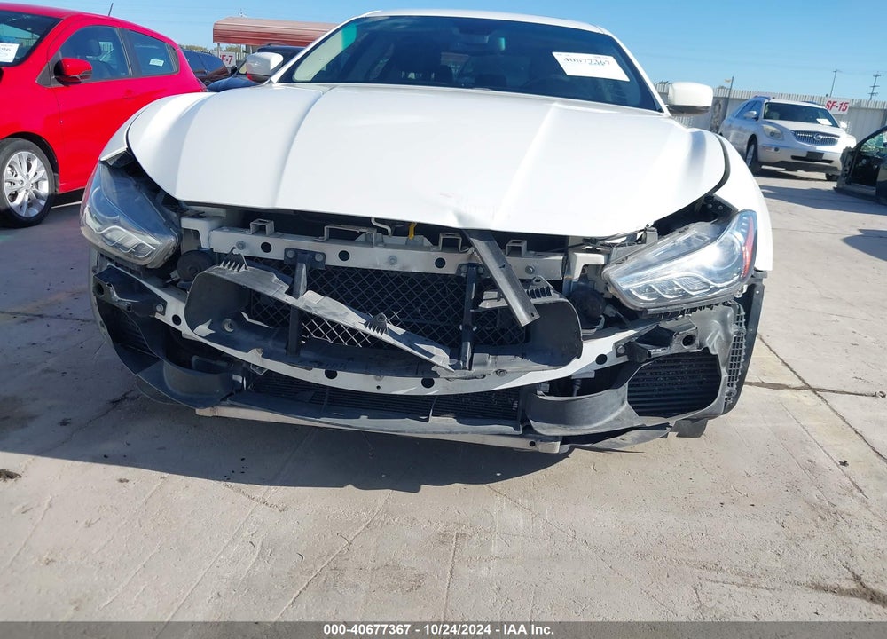 2014 MASERATI GHIBLI VIN: ZAM57RTA7E1109644