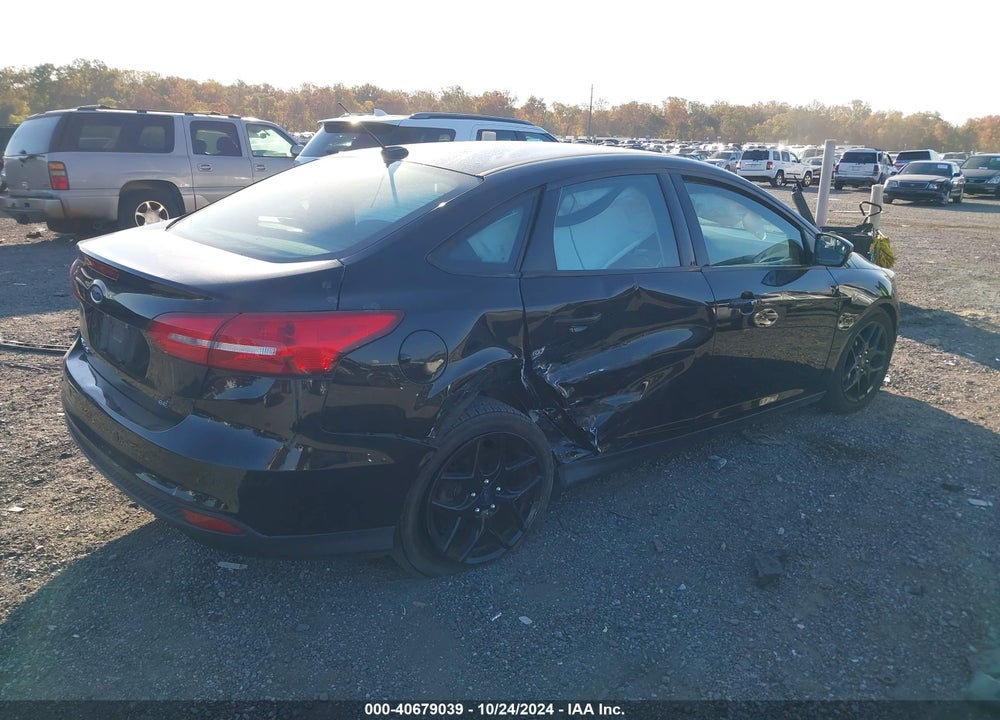 2016 FORD FOCUS SE VIN: 1FADP3F29GL260872