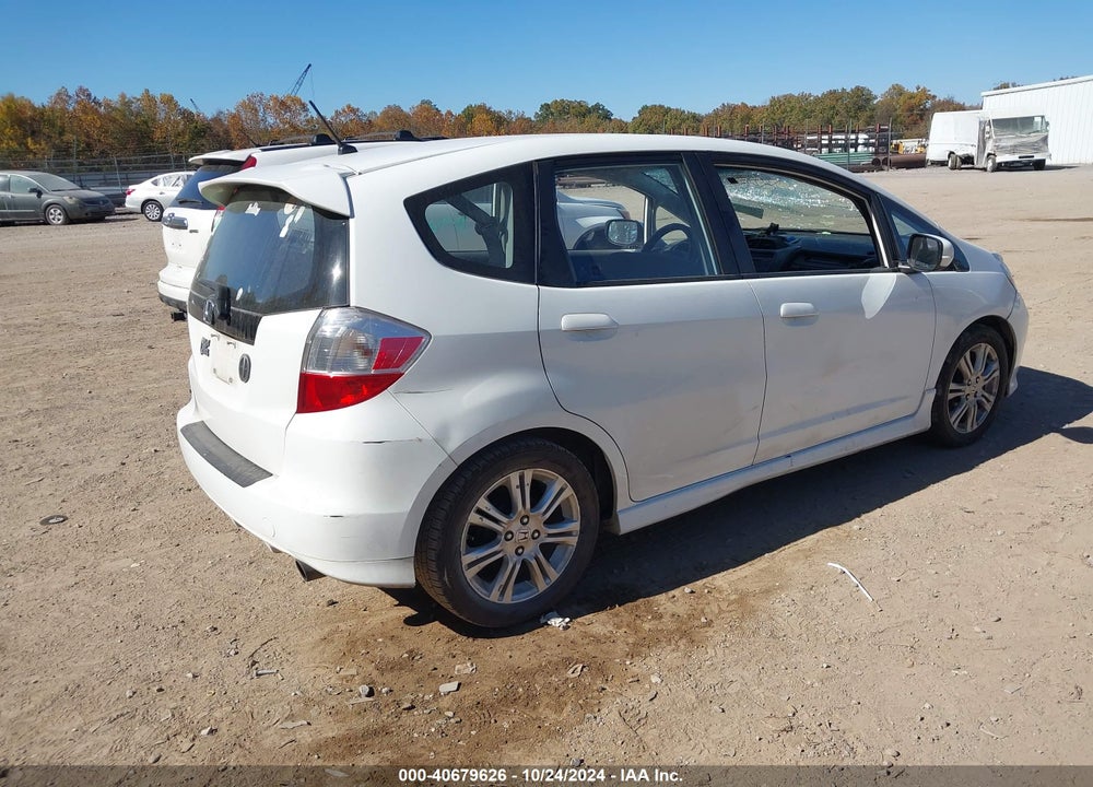 2009 HONDA FIT SPORT VIN: JHMGE88439S006316