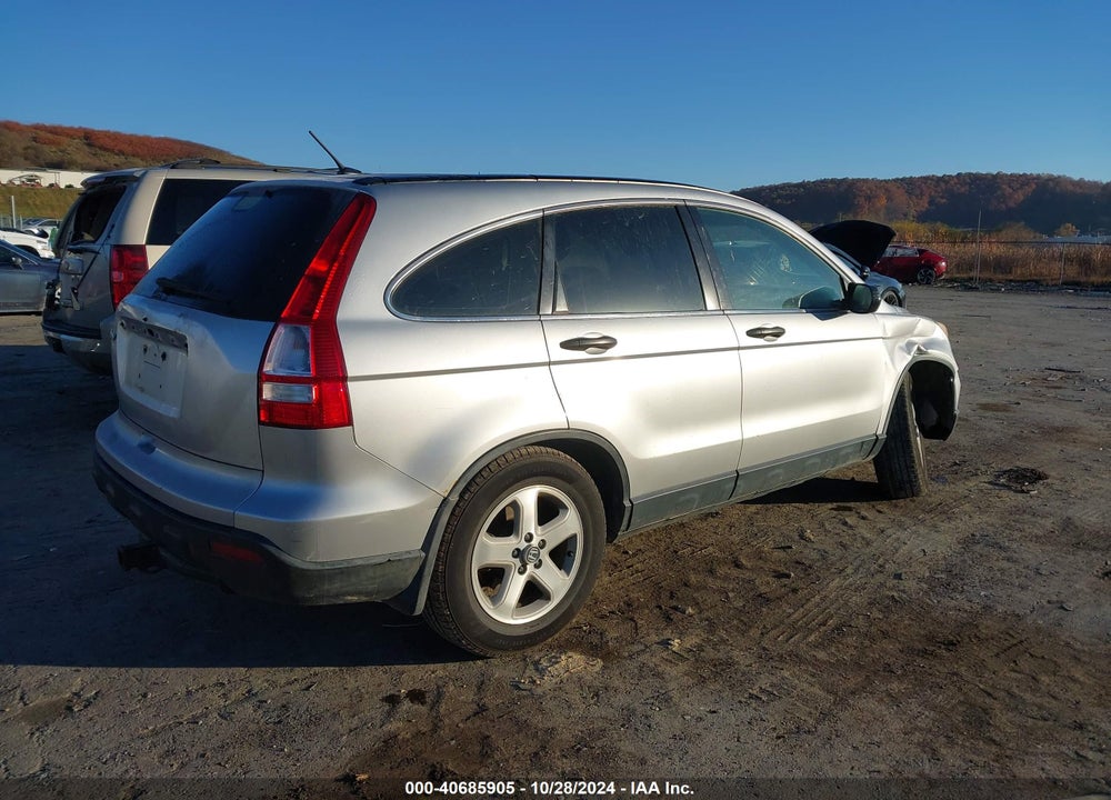 2009 HONDA CR-V LX VIN: JHLRE48349C007319