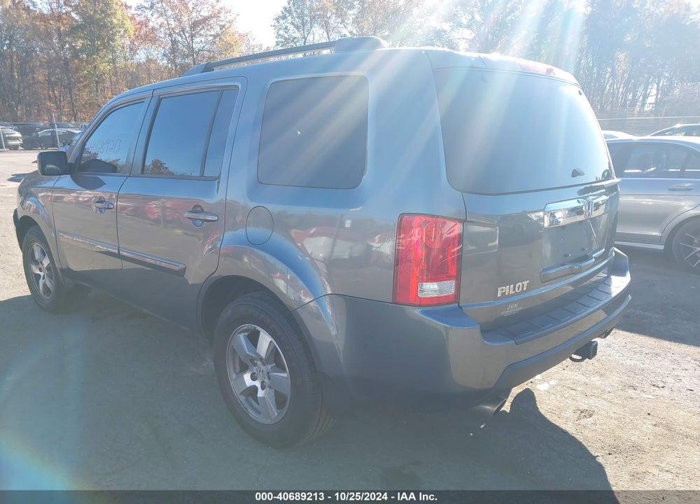 2011 HONDA PILOT EX-L VIN: 5FNYF4H51BB009416
