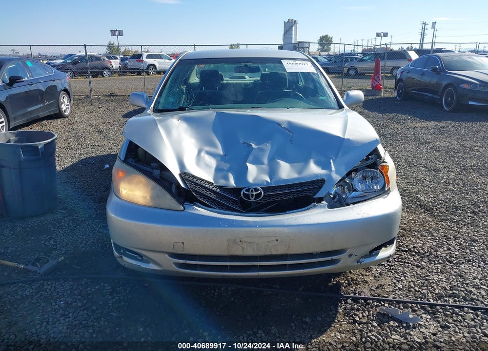 2003 TOYOTA CAMRY LE VIN: JTDBE32K330174921