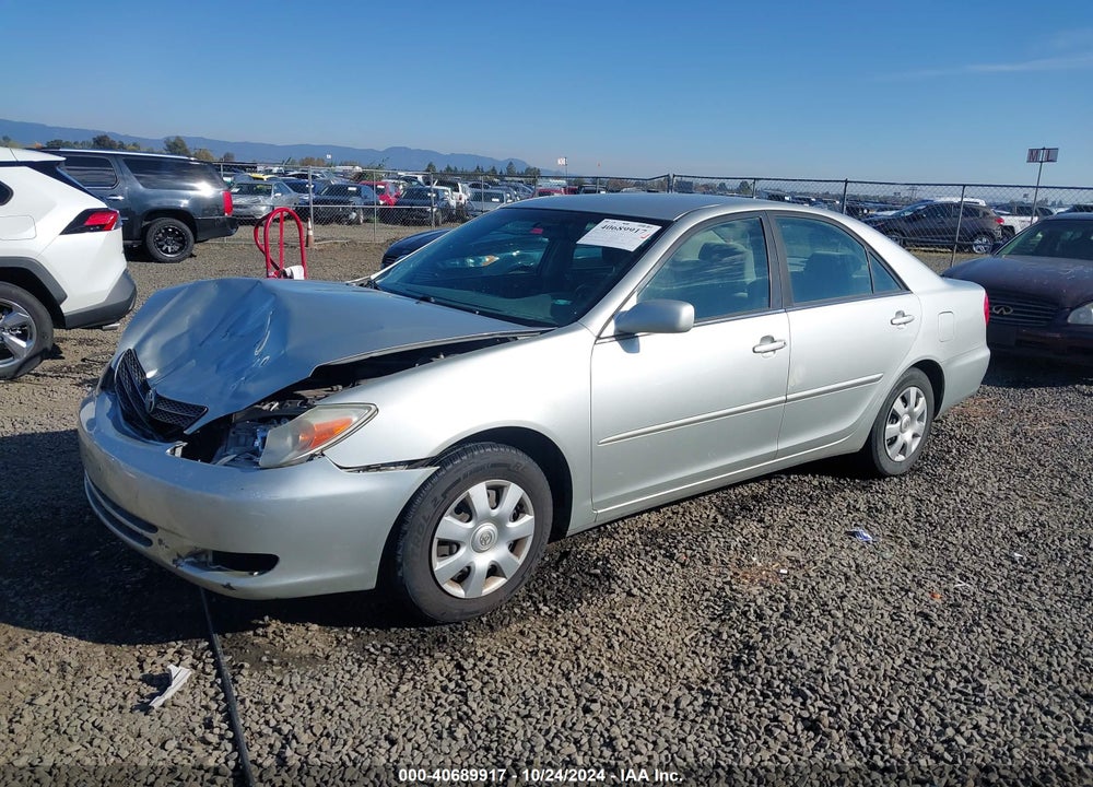 2003 TOYOTA CAMRY LE VIN: JTDBE32K330174921
