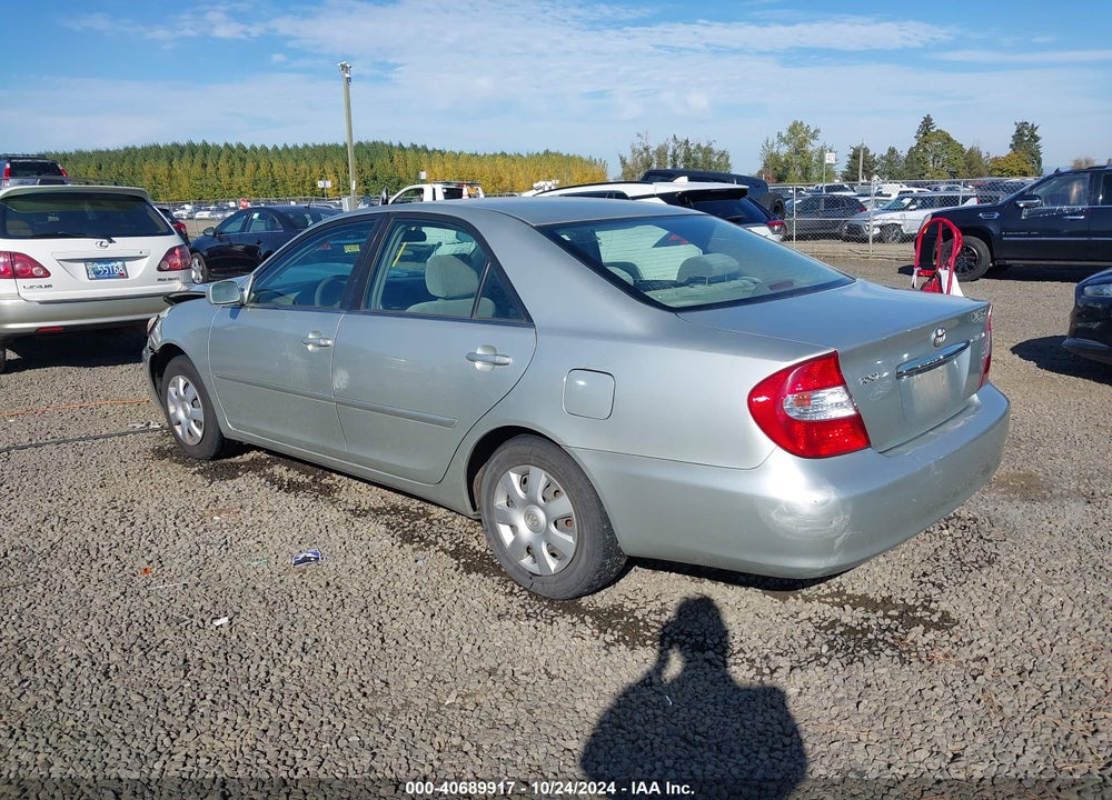 2003 TOYOTA CAMRY LE VIN: JTDBE32K330174921