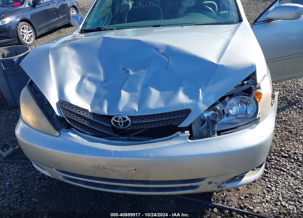 2003 TOYOTA CAMRY LE VIN: JTDBE32K330174921